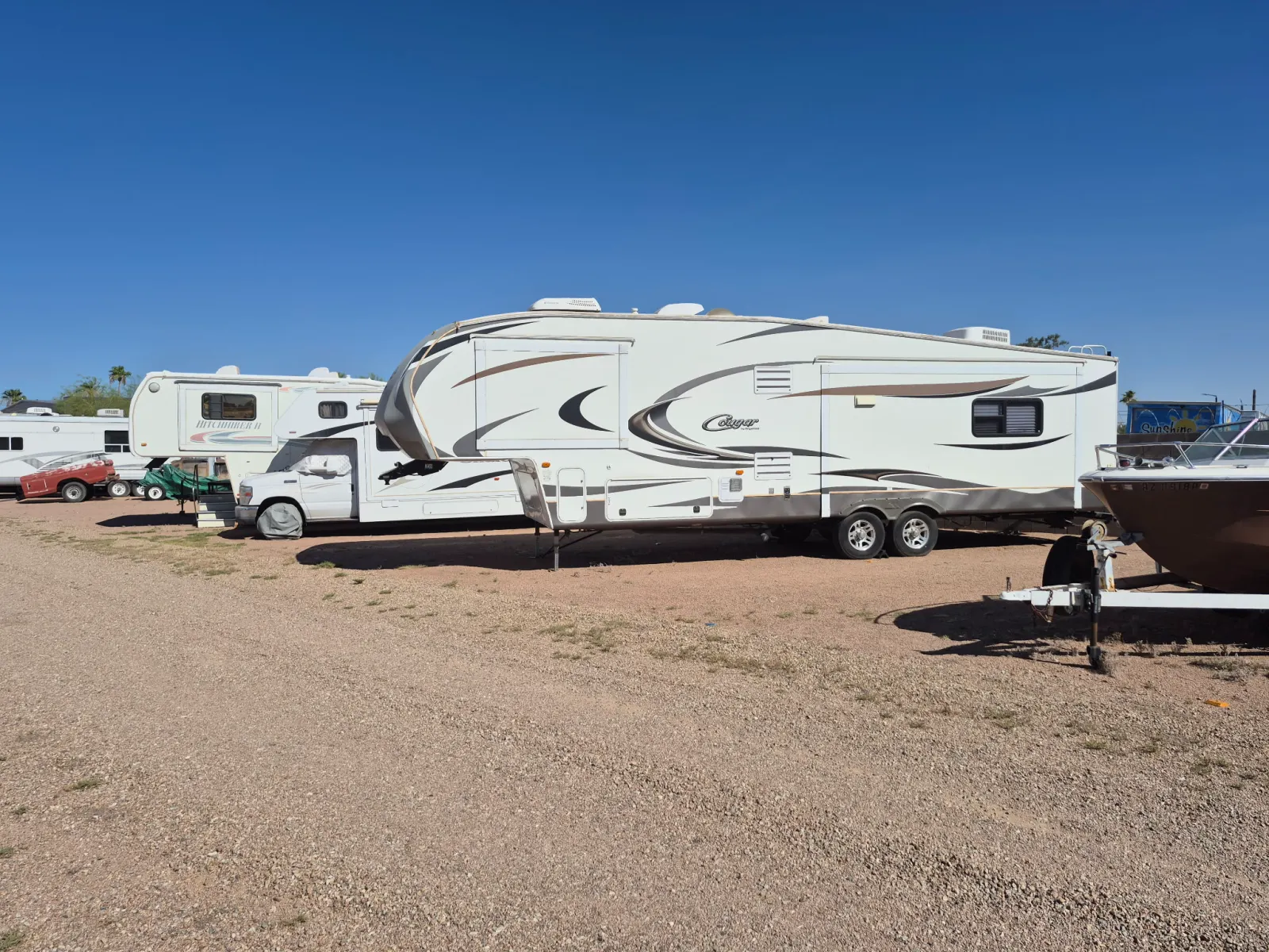 Large fifth-wheel RV stored at the facility
